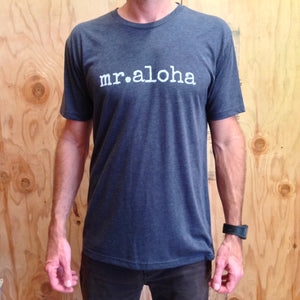 man with watch wearing a blue tshirt that says mr. aloha in white font