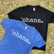 two tshirts laying on the grass with the word 'ohana on them