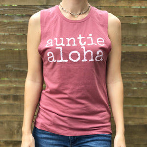 woman wearing a rose pink auntie aloha muscle tank with choker necklace