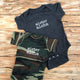 vintage navy and camouflage baby onesie with white lettering that says mister aloha