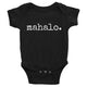 black gender neutral baby Ivy & Co. onesie with white writing that says mahalo which means thank you
