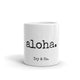 white mug with black font that says aloha