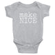grey gender neutral baby Ivy & Co. onesie with white writing that says make nice