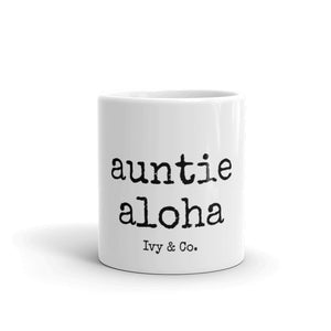 white mug with black font that says auntie aloha