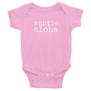 pink baby girl Ivy & Co. onesie with white writing that says auntie aloha