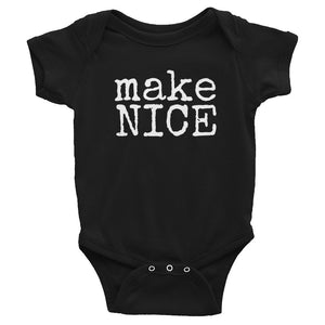 black gender neutral baby Ivy & Co. onesie with white writing that says make nice